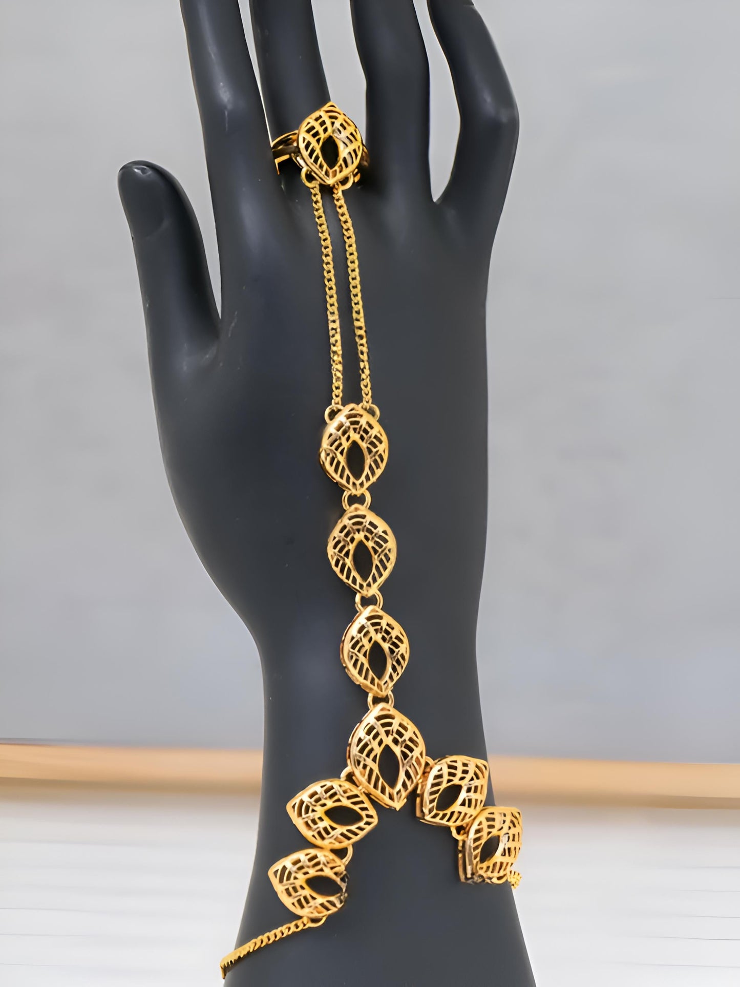 Gold-Plated Hand Chain Bracelet with Ring – Intricate Leaf Design – Elegant Arabic Jewelry for Women