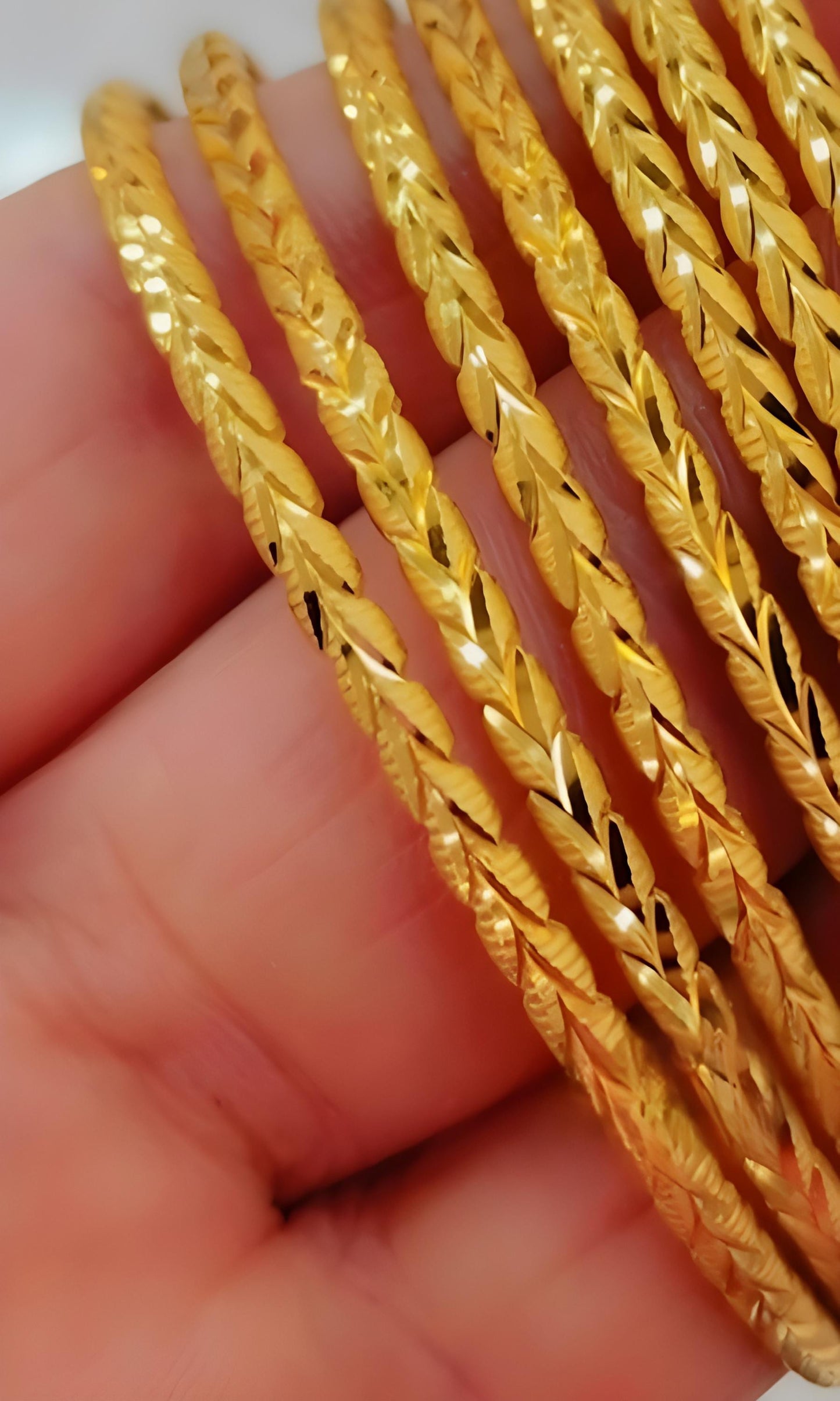 7 Gold-Plated Bangles Set – 7 -Piece Stackable Bracelets with Elegant Leaf Design