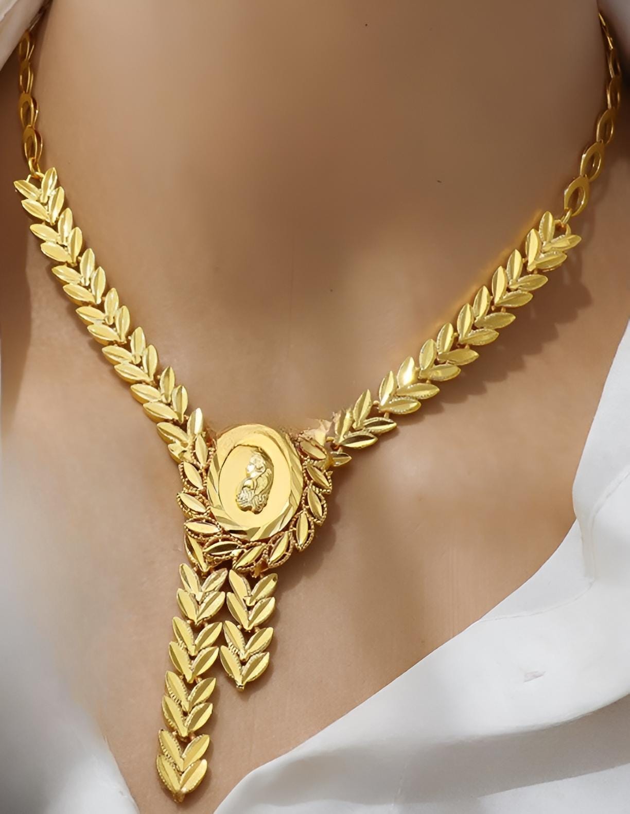 Elegant Olive Leaf Gold-Plated Jewelry Set – Necklace, Bracelet & Earrings