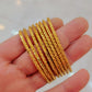7 Gold-Plated Bangles Set – 7 -Piece Stackable Bracelets with Elegant Leaf Design